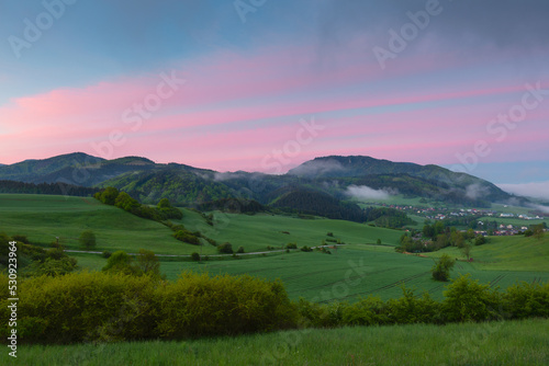 Village of Bela-Dulice and Velka Fatra mountain range, Slovakia.