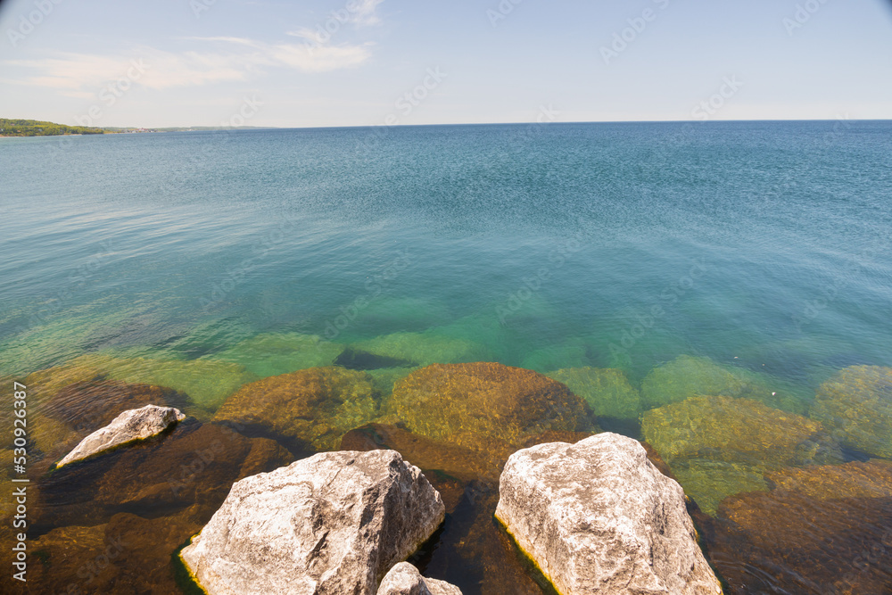 Rocks of a breakwater in the lake Rocks of a breakwater in the lake