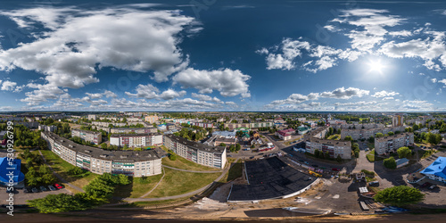 aerial full seamless spherical 360 hdri panorama view in city overlooking of residential area of high-rise buildings in equirectangular projection. © hiv360