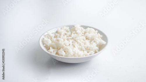 Bowl of cooked rice.Isolated on a white background