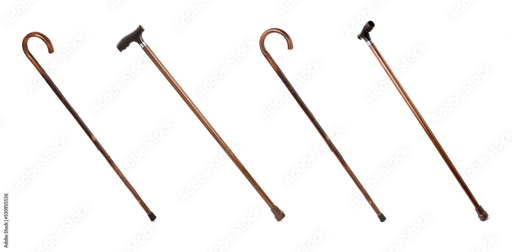 Set with elegant wooden walking canes on white background. Banner design Set with elegant wooden walking canes on white background. Banner design