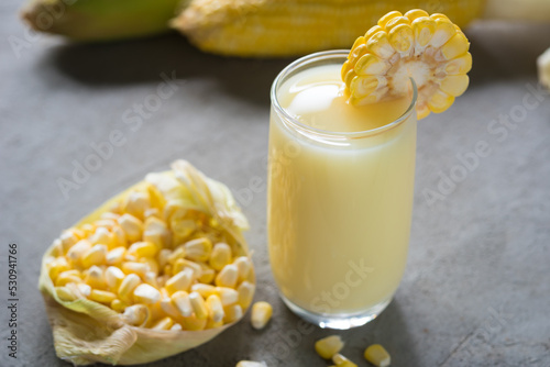 Yellow Sweet corn drink on wood  background , Yellow Corn juice, sweet corn milk, healthy organic food, bio nutrition