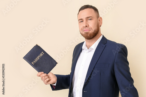 Businessman with big passpo...