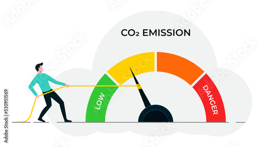 A man pulling rope at CO2 emission level to low position. Zero emission concept, clean and sustainable technology, stop global warming template photo