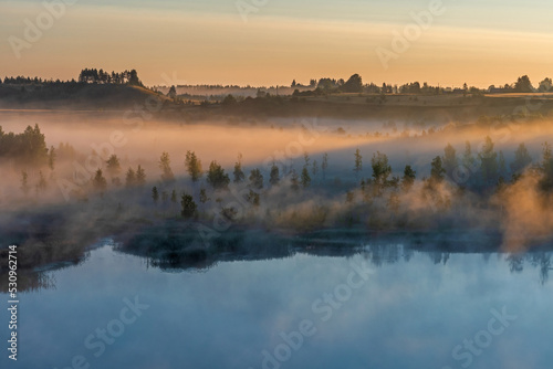 Foggy dawn in Izborsko-Malskaya Valley, Pskov region