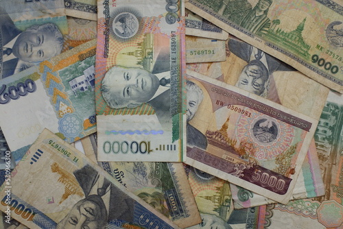 Laos Kip banknotes close-up. Money background. Laos currency - Kip. Pattern texture and background of Laos Kip money, currency banknotes ready for exchange and business investment. photo
