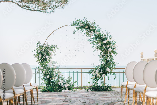 wedding arch on the background of the sea photo
