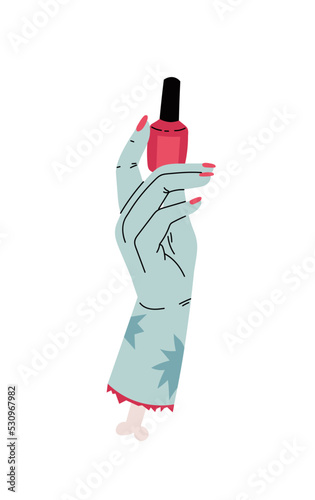 A zombie's hand with a protruding bone is holding nail polish.