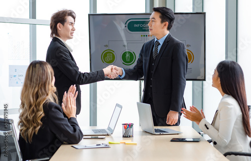 фотографія Millennial Asian successful professional male businessmen in formal suit standin