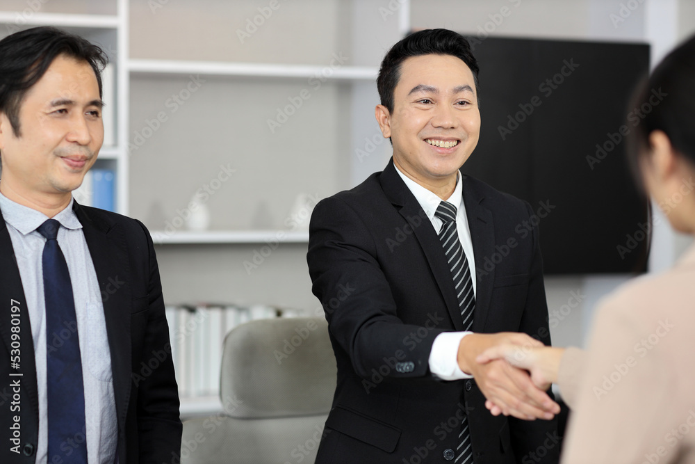 Image of success business people team shaking hands meaning of introduction, greeting, success negotiation or finishing up meeting. Gesturing connection deal concept. Image of success business people team shaking hands meaning of introduction, greeting, success negotiation or finishing up meeting. Gesturing connection deal concept.