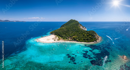 The beautiful island of Marathonisi or Turtle island in the bay of Laganas with turquoise sea and sand beaches, Zakynthos, Greece