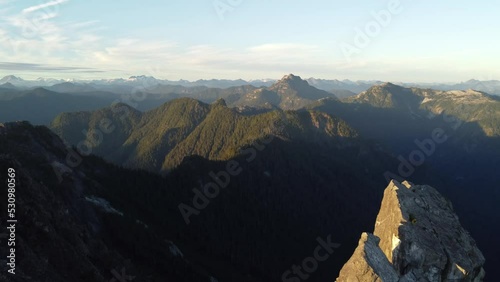 Epic Aerial Drone View from Crown Mountain Peak of Rocky Diverse Tree Covered Landscape in British Columbia Canada 4K photo