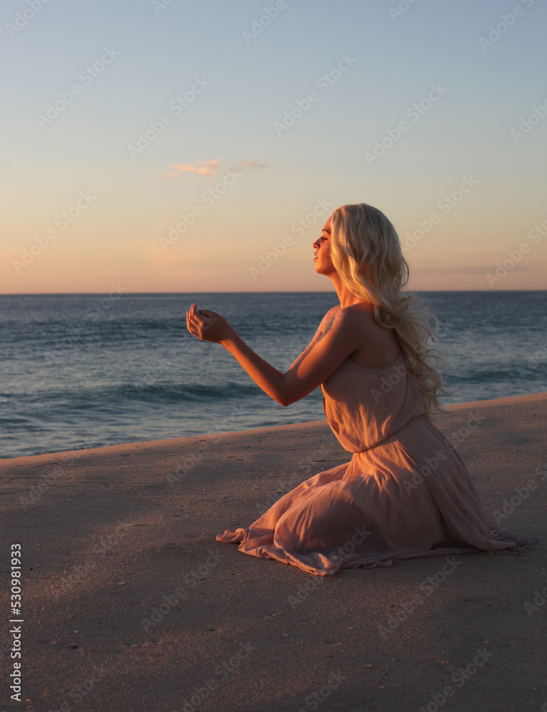 full length portrait of beautiful young woman with long hair wearing ...