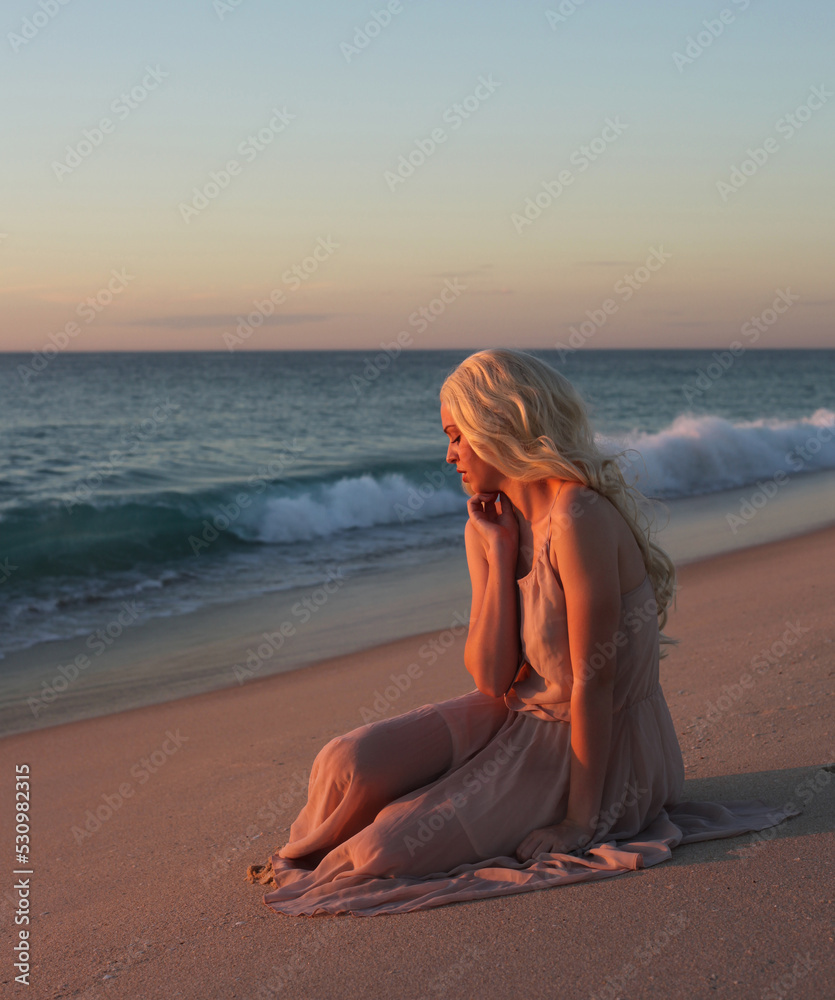 full length portrait of beautiful young woman with long hair wearing ...