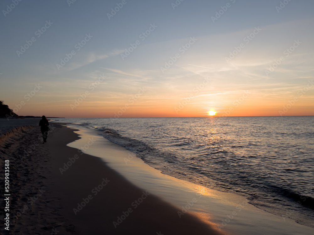 Sunset on the beach on the Baltic Sea in Jastrzebia Gora in Poland