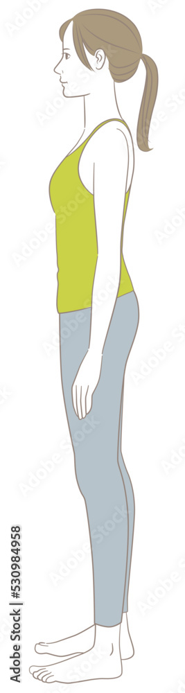 正しい姿勢で立つ横向きの女性