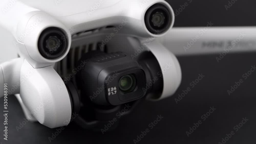 Mini 3 Pro drone of Dji brand with Vertical camera on dark background