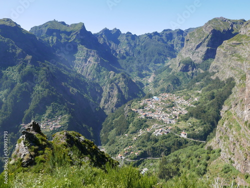 Landscape of Curral das Freiras village in nuns valley on european Madeira island in Portugal, clear blue sky in 2022 warm sunny spring day on June.