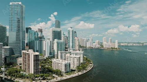 drone video of miami downtown with coastline and water