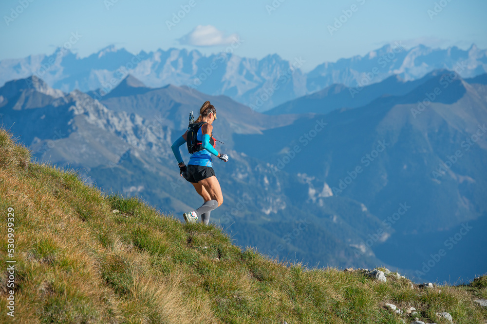 Woman running in the mountains