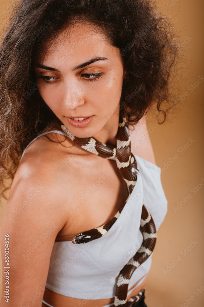 Close up of a girl with her snake