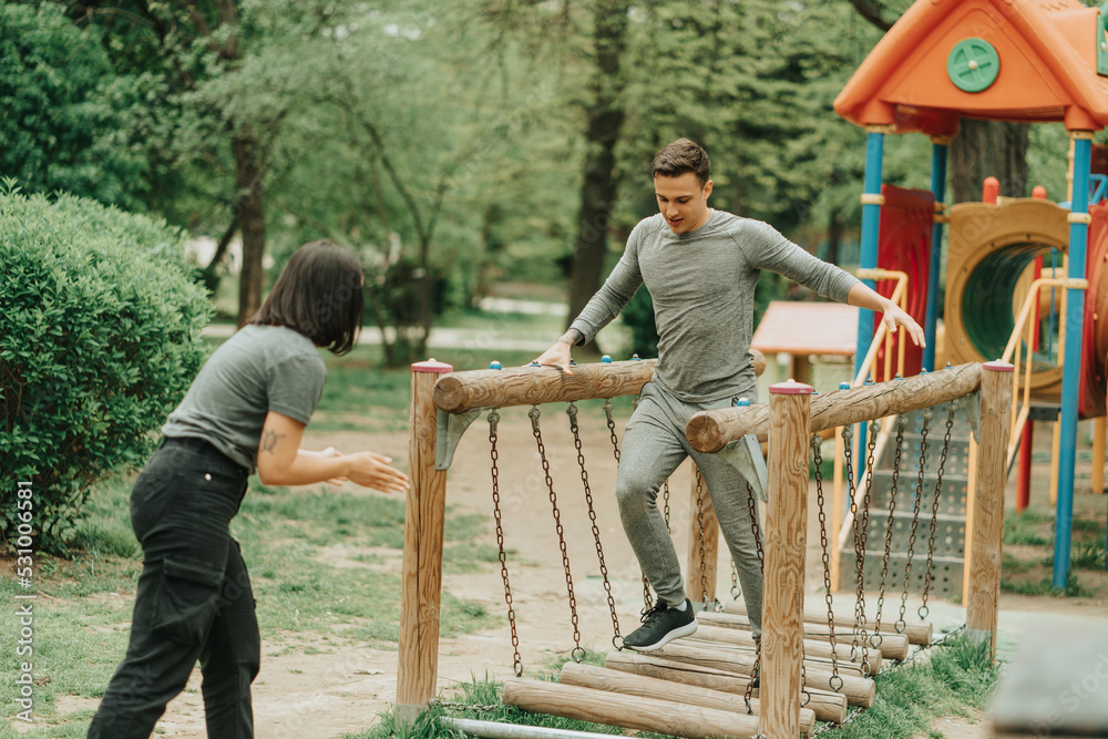Boy jumping on the wooden stairs Boy jumping on the wooden stairs