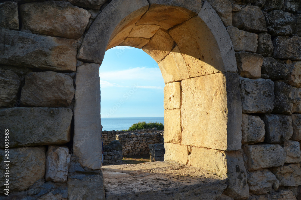 Old stone window in Chersonesos with a view of the Black Sea