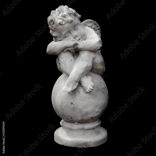 plaster statue of an antique angel on a black background