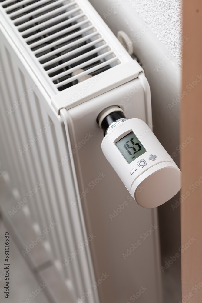 Woman's hand adjusting temperature. Woman's hand adjusting temperature.