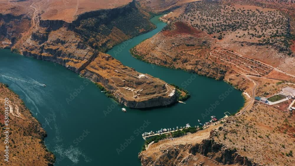 aerial footage of Rumkale Castle,  top view of old roman castle on midday boats and sightseen balcony toruistic attraction point 