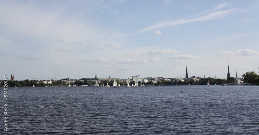 Sightseeing tour on the Alster in Hamburg with a view of 5 famous church towers