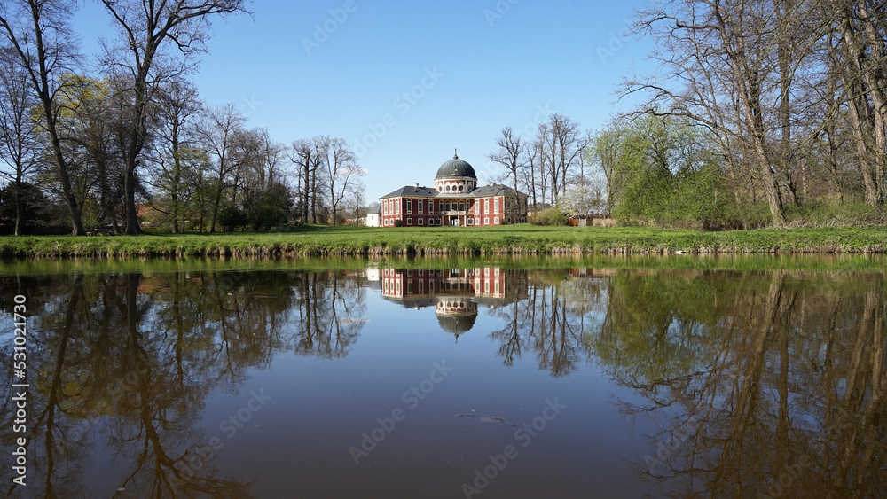 Veltrusy Mansion (Zamek Veltrusy), baroque chateau mirroring in pond, including large park, popular tourist landmark, Czechia