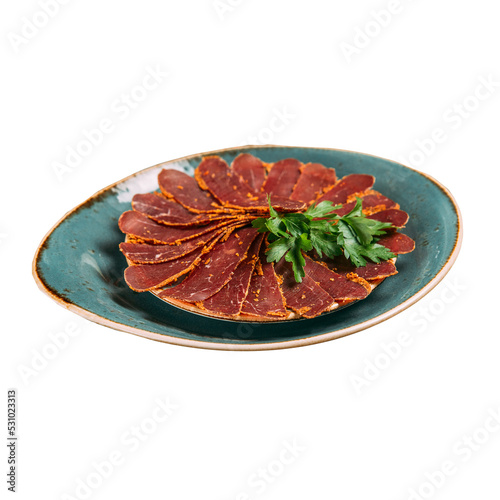 Plate of sliced dried beef tenderloin basturma photo