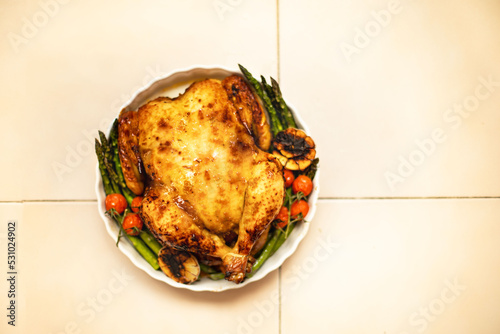 Whole fried chicken with vegetables