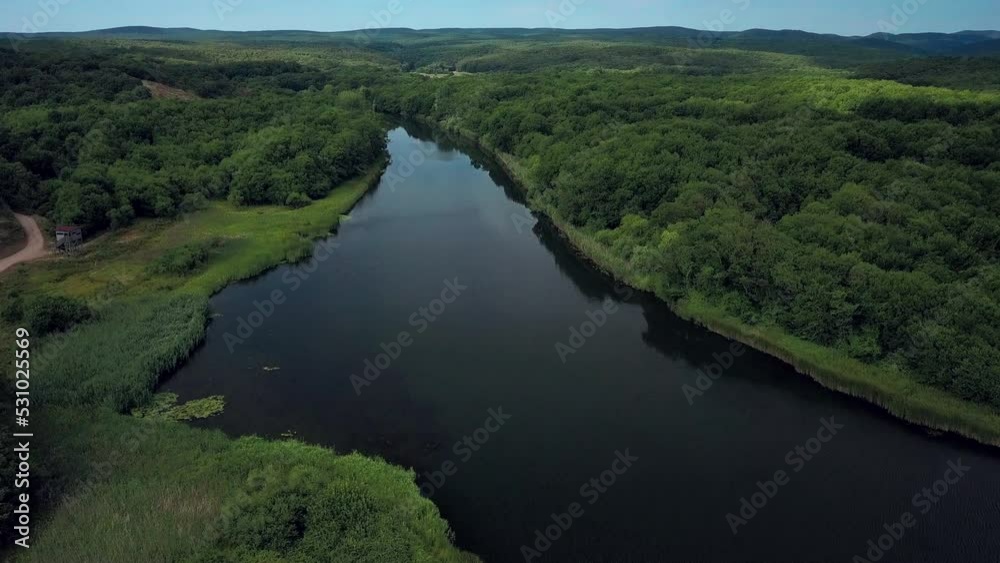 Serene Nature Of Veleka River With Lush Tree Foliage In Sinemorets, Bulgaria. Aerial Shot Serene Nature Of Veleka River With Lush Tree Foliage In Sinemorets, Bulgaria. Aerial Shot