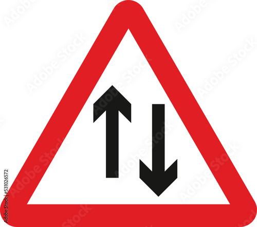 Two-way traffic straight ahead, The Highway Code Traffic Sign, Signs giving orders, Signs with red circles are mostly prohibitive. Plates below signs qualify their message.