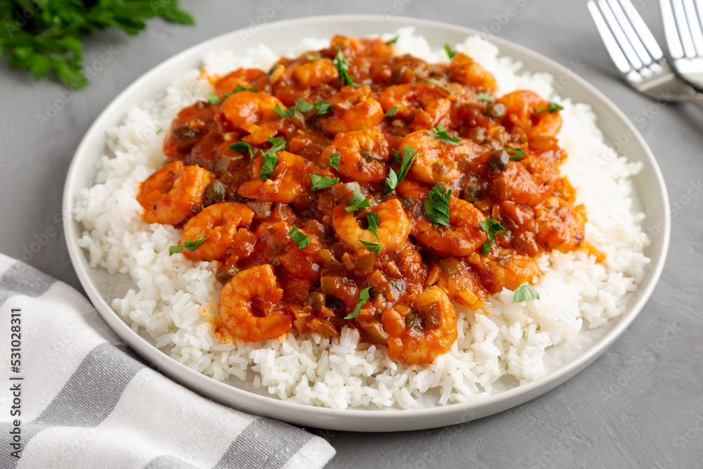 Homemade Cuban Shrimp Creole on a Plate on a gray background, side view. Close-up. Homemade Cuban Shrimp Creole on a Plate on a gray background, side view. Close-up.