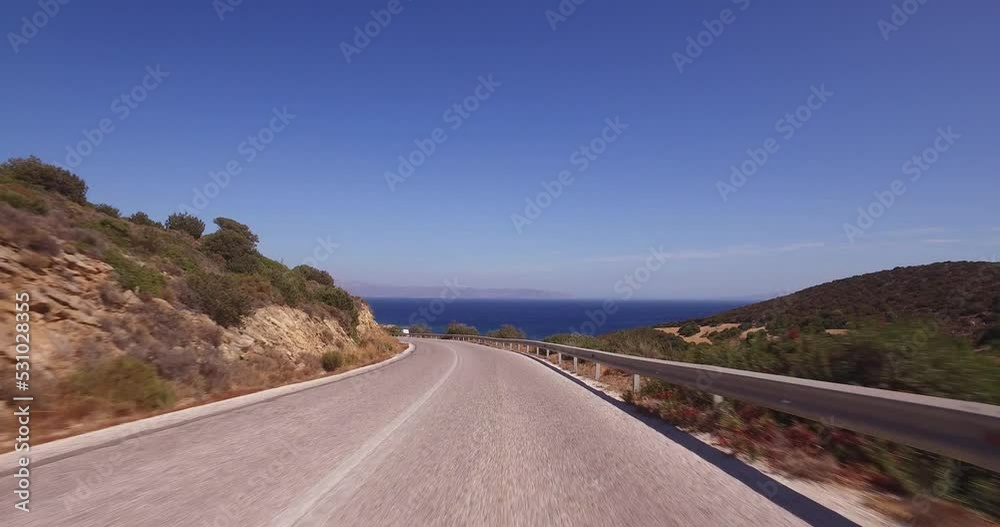 Travel by car in Paros island in Greece. View from the window