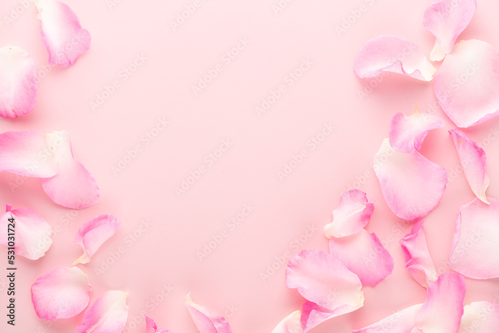 Rose flowers petals on pastel background. Valentines day background. Flat lay, top view, copy space.