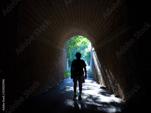 person in the tunnel