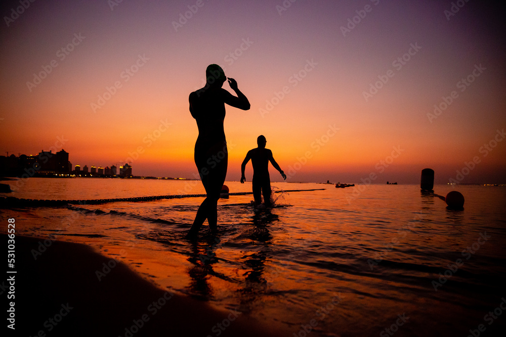 Ocean Swimmers at Sunrise, Qatar