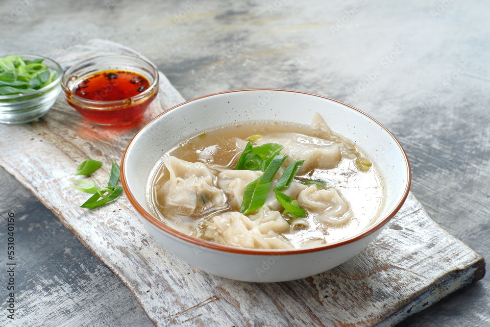 delicious of wonton soup with chili oil and green onion,chinese food,asian food style