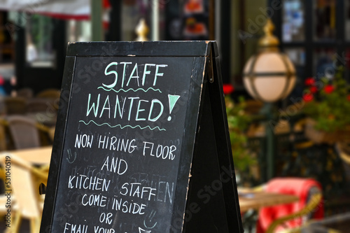 Staff wanted recruitment sign outside a restaurant in Europe photo