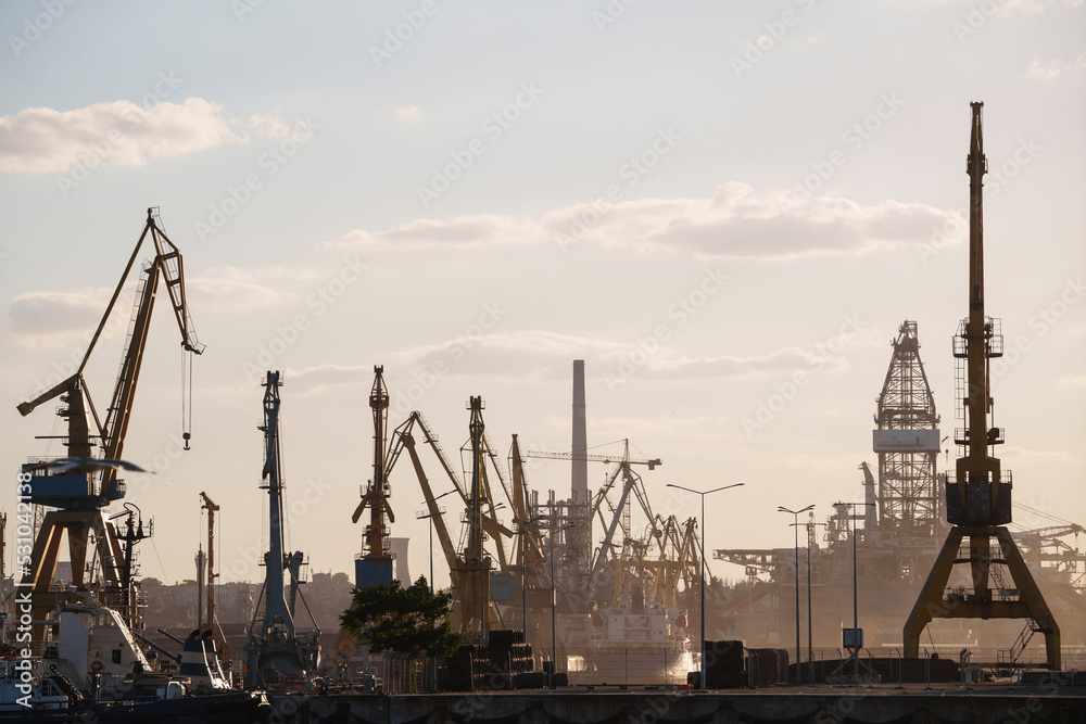 Obraz premium Container terminal, with cranes, in a commercial port
