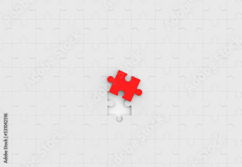 Jigsaw puzzle with one red piece