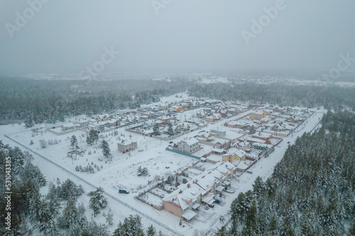 Aerial view of small cottage town at winter. Drone photo © Anton Tolmachov