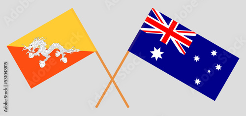 Crossed flags of Bhutan and Australia. Official colors. Correct proportion