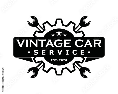 Wrench key with gear for servicing in the garage car symbol icon vector. Crossed wrench for automotive repair engine car illustration vintage logo design