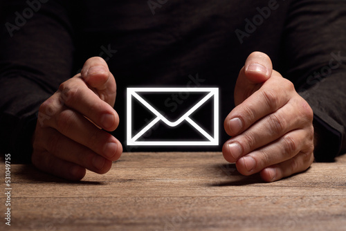 Concept of receiving mail, protection and preservation of personal correspondence. Men's hands close-up