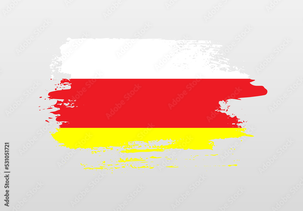Fototapeta premium Modern style brush painted splash flag of North Ossetia with solid background